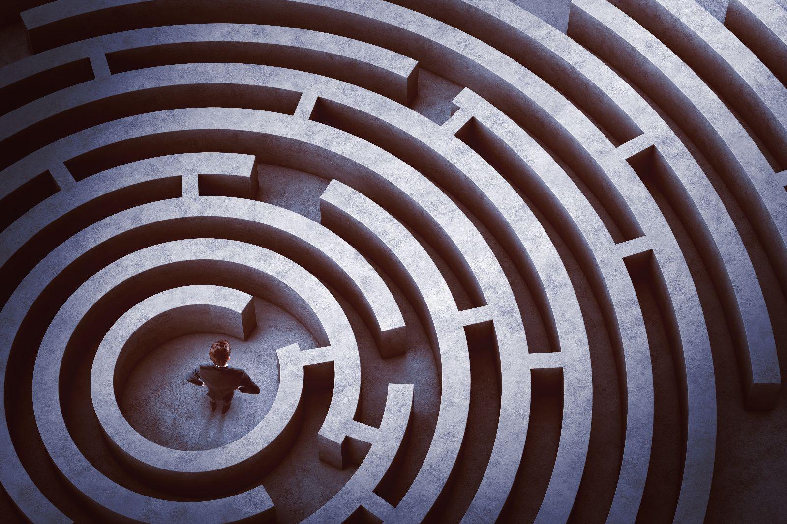 Man at center of a round-shaped maze