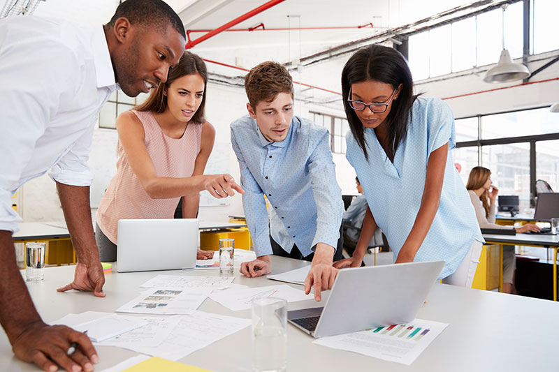 A young team discussing a problem